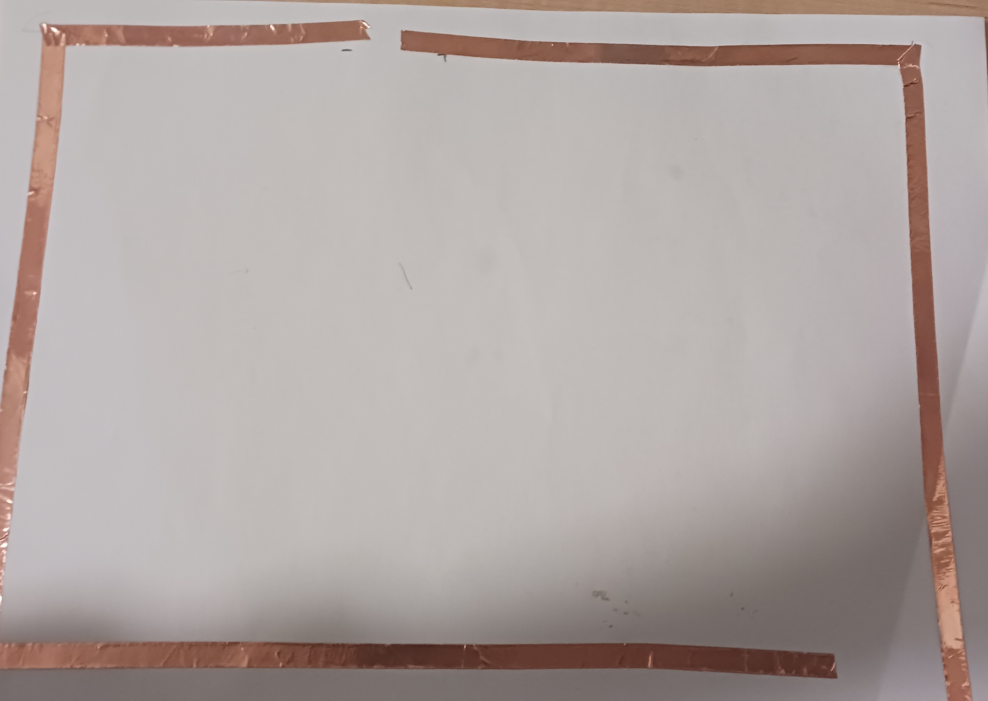 Laying down copper tape for simple circuit