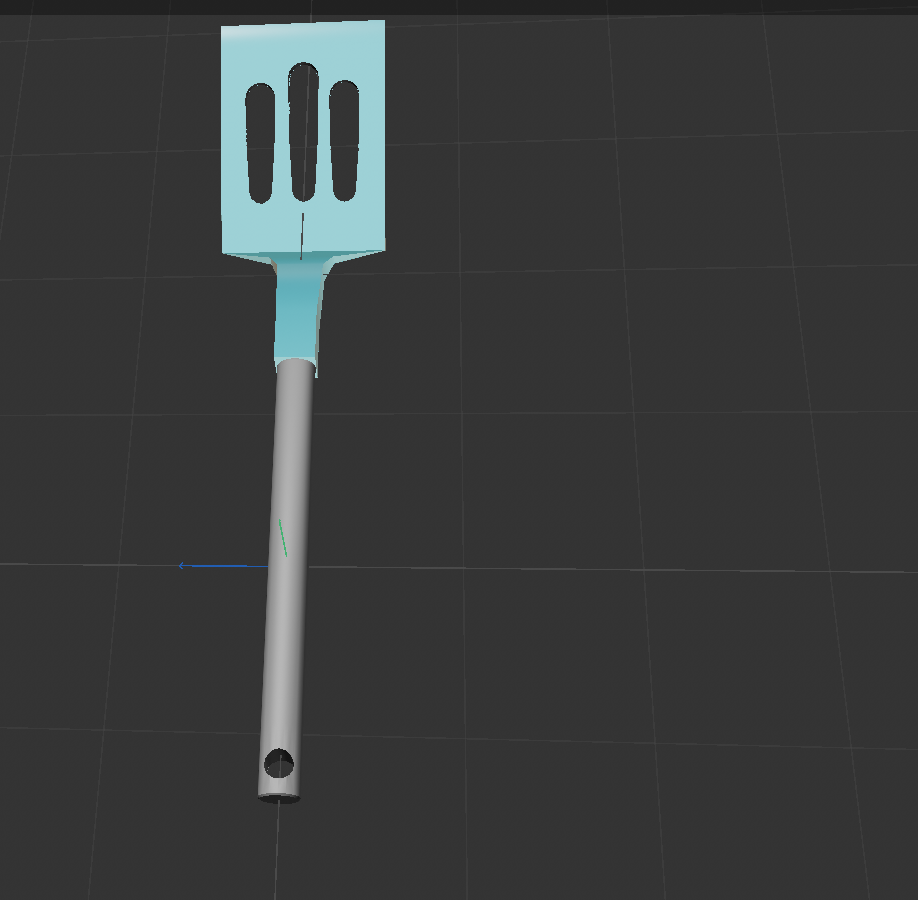 Process work: model of spatula before wood textures have been appllied to the handle